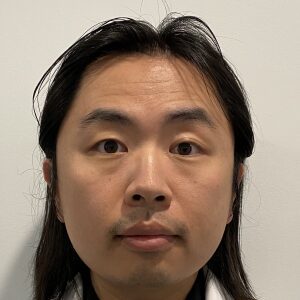 Headshot of Dr. Chuan Jiang, a voluntary attending physician for Jamaica Hospital's Pulmonary Fellowship program.