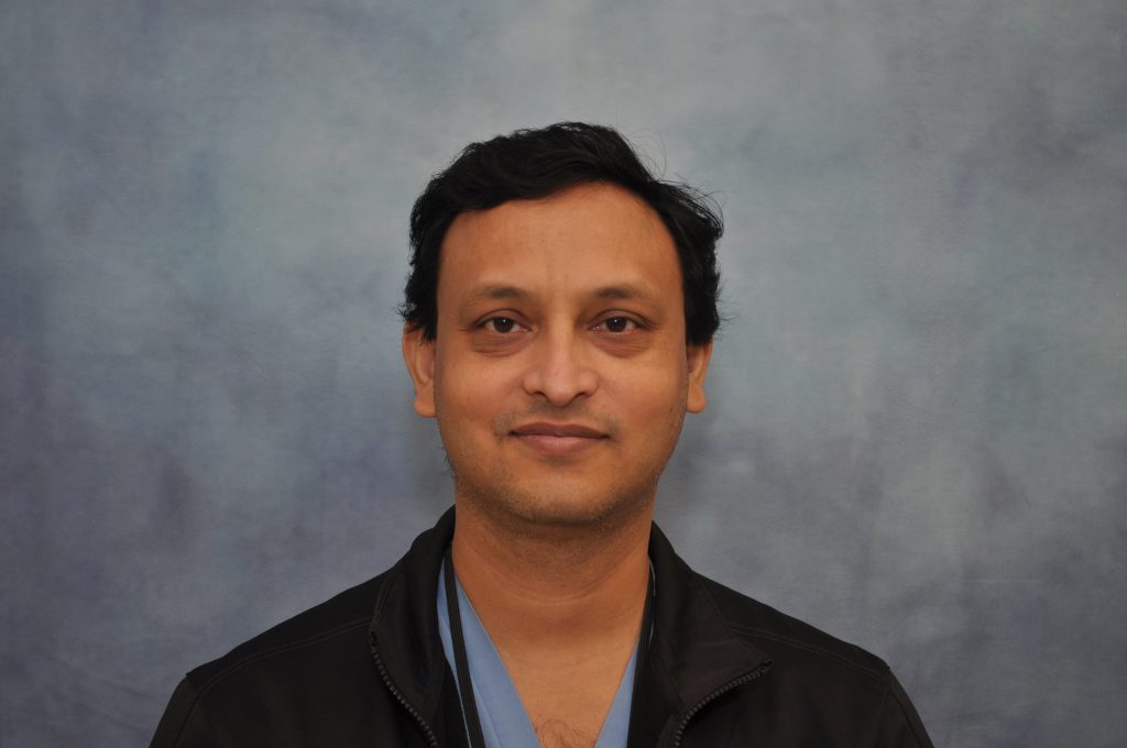 A headshot photo of Mir Uddin, a resident working with Jamaica Hospital Medical Center's Podiatry residency program.