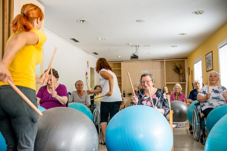 Seniors In The Retirement Home Having Group Therapy